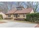 A charming single-story house with a well-manicured lawn and neat shrubbery at 3847 Admiral Dr, Chamblee, GA 30341