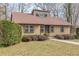 Well-kept single-story home with a manicured lawn and tasteful landscaping at 3847 Admiral Dr, Chamblee, GA 30341