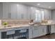 Stylish kitchen showcasing sleek cabinets, granite counters, stainless appliances, and breakfast bar at 3847 Admiral Dr, Chamblee, GA 30341