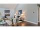 Bright living room featuring vaulted ceiling, fireplace, and hardwood flooring at 3847 Admiral Dr, Chamblee, GA 30341
