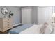 Spacious main bedroom featuring hardwood floors, neutral decor, and ample closet space at 3847 Admiral Dr, Chamblee, GA 30341