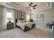 Spacious main bedroom with tray ceiling, carpet flooring and plenty of natural light at 3850 Ivy Cottage Se Dr, Snellville, GA 30039