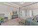 Main bedroom with a sitting area, a large bed and plenty of natural light at 3850 Ivy Cottage Se Dr, Snellville, GA 30039
