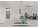 Relaxing covered patio with seating area and fireplace at 3850 Ivy Cottage Se Dr, Snellville, GA 30039