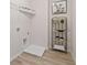 Laundry room with shelving, flooring, and stylish decor at 3850 Ivy Cottage Se Dr, Snellville, GA 30039