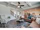 Open concept living room with a view of the kitchen and staircase at 3850 Ivy Cottage Se Dr, Snellville, GA 30039