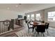 Game and seating area in a bright loft with hardwood floors at 3850 Ivy Cottage Se Dr, Snellville, GA 30039