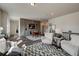 A loft with a game table, seating area, and wood flooring at 3850 Ivy Cottage Se Dr, Snellville, GA 30039