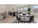 Spacious loft with a seating area, game table, and wood floors at 3850 Ivy Cottage Se Dr, Snellville, GA 30039