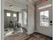 Home office with built-in shelving and window seat. Plenty of natural light at 3850 Ivy Cottage Se Dr, Snellville, GA 30039
