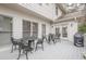 Back porch with ample seating and grill, perfect for outdoor entertaining at 5216 Old Mountain Ln, Powder Springs, GA 30127