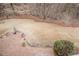 View of the backyard featuring a brick patio, decorative fountain, and mature landscaping at 5216 Old Mountain Ln, Powder Springs, GA 30127