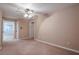 Bedroom with a carpet, ceiling fan, and neutral paint at 5216 Old Mountain Ln, Powder Springs, GA 30127