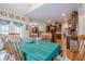Open concept dining room featuring views into the kitchen area, perfect for entertaining at 5216 Old Mountain Ln, Powder Springs, GA 30127