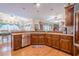 Bright kitchen featuring wood cabinets, granite countertops and stainless steel appliances at 5216 Old Mountain Ln, Powder Springs, GA 30127