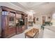 Open living room with a fireplace and large media center that's perfect for relaxing and entertaining at 5216 Old Mountain Ln, Powder Springs, GA 30127
