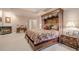 Luxurious main bedroom with a fireplace, sitting area, and elegant furnishings at 5216 Old Mountain Ln, Powder Springs, GA 30127