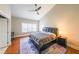 Spacious bedroom featuring a large bed, hardwood floors, and a window for natural light at 5430 Glenridge Vw # 1601, Sandy Springs, GA 30342