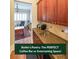 Charming butler's pantry with granite countertops, wooden cabinetry, and a view of the office at 5430 Glenridge Vw # 1601, Sandy Springs, GA 30342