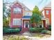 Charming brick home featuring a covered porch entry and well-manicured landscaping for curb appeal at 5430 Glenridge Vw # 1601, Sandy Springs, GA 30342