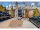 Two-story brick building with a large arched entryway and manicured landscaping at 5430 Glenridge Vw # 1601, Sandy Springs, GA 30342