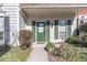 Attractive green front door with walkway leading to the entrance at 1304 Wedgewood Ct, Atlanta, GA 30350