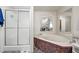 Updated bathroom with walk-in shower and tub at 1050 Zion Church Rd, Dallas, GA 30157