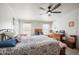 Large bedroom with a ceiling fan and dresser at 1050 Zion Church Rd, Dallas, GA 30157