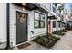 Charming townhome entrances with colorful front doors and meticulously landscaped gardens at 1260 Wright Se Ln, Atlanta, GA 30316