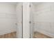 Walk-in closet with ample shelving and hanging space at 305 Sobeck Way, Canton, GA 30115