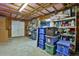 Partially finished basement with shelving and storage at 1403 Shiloh Oak Dr, Loganville, GA 30052
