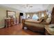 Spacious bedroom with hardwood floors and a large bed at 1403 Shiloh Oak Dr, Loganville, GA 30052