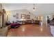 Spacious living room with hardwood floors, a stone fireplace, and comfortable seating at 1403 Shiloh Oak Dr, Loganville, GA 30052