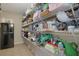 Well-stocked pantry with wire shelving for ample storage at 1403 Shiloh Oak Dr, Loganville, GA 30052