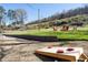 Large backyard with cornhole and firepit at 15 E Georgia Ave, Emerson, GA 30137