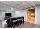 Finished basement features a media area and extra sleeping space at 15 E Georgia Ave, Emerson, GA 30137