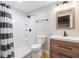 Basement bathroom with shower, toilet and modern vanity at 15 E Georgia Ave, Emerson, GA 30137