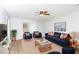Stylish living room features coordinated furniture and wood floors at 8690 Ashley Way, Douglasville, GA 30134
