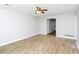 Bright, open living room with wood flooring and neutral paint at 8690 Ashley Way, Douglasville, GA 30134