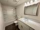 Bright bathroom with quartz countertop, modern vanity, updated fixtures, and tub-shower combo at 9240 Prestwick Club Dr, Duluth, GA 30097