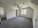 Bright bedroom with neutral walls and carpet flooring at 9240 Prestwick Club Dr, Duluth, GA 30097
