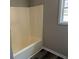 Simple bathroom with a shower/tub combo and vinyl flooring at 380 River Trace Dr, Villa Rica, GA 30180