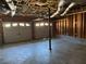 Unfinished two-car garage with concrete floor at 380 River Trace Dr, Villa Rica, GA 30180