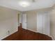 Spacious bedroom with wood flooring and a large closet at 4095 Maxanne Nw Dr, Kennesaw, GA 30144