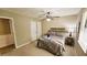 Bright bedroom with neutral decor and ceiling fan at 1906 Young Rd, Lithonia, GA 30058