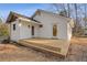 Newly constructed backyard deck extends from the home, with easy access to the yard at 2046 Harold Se Ave, Smyrna, GA 30080