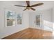 Bedroom features hardwood floors and a door to the outside at 2046 Harold Se Ave, Smyrna, GA 30080