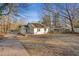 A charming home sits on a spacious lot with a driveway and backyard at 2046 Harold Se Ave, Smyrna, GA 30080