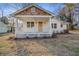 Charming home with a white picket fence, covered porch, and warm wood accents at 2046 Harold Se Ave, Smyrna, GA 30080