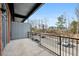 Balcony overlooking a parking lot and city buildings in the distance at 5200 Peachtree Rd # 3221, Chamblee, GA 30341